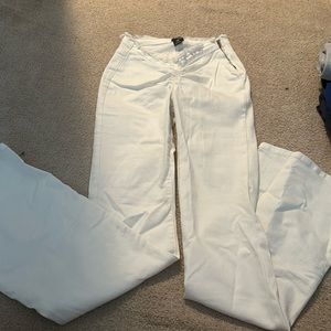 The cutest most flattering, soft and stretchy flared white jeans